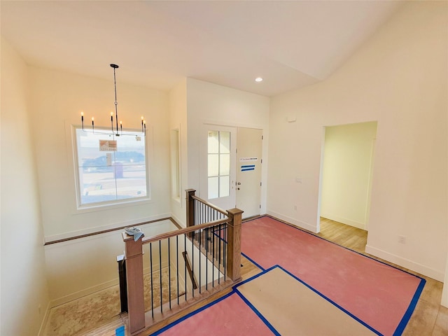 entrance foyer with a notable chandelier