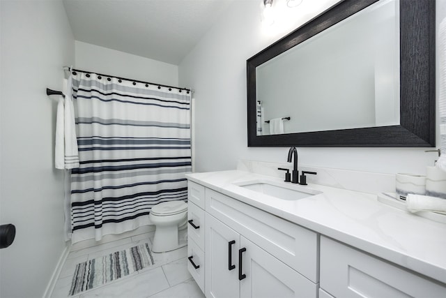 bathroom featuring toilet, walk in shower, and vanity