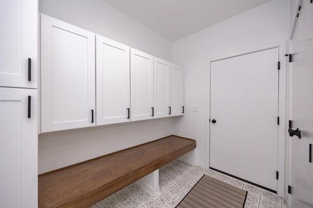 mudroom featuring light tile patterned floors