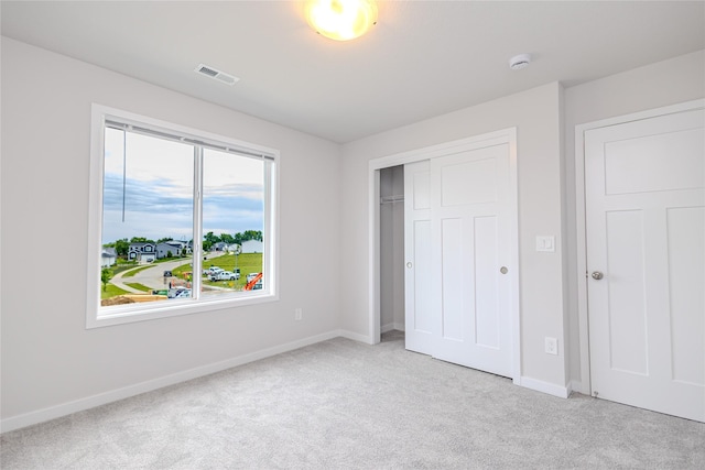 1703 Gordon Ct, Norwalk, IA 50211 - unfurnished bedroom with carpet floors and a closet