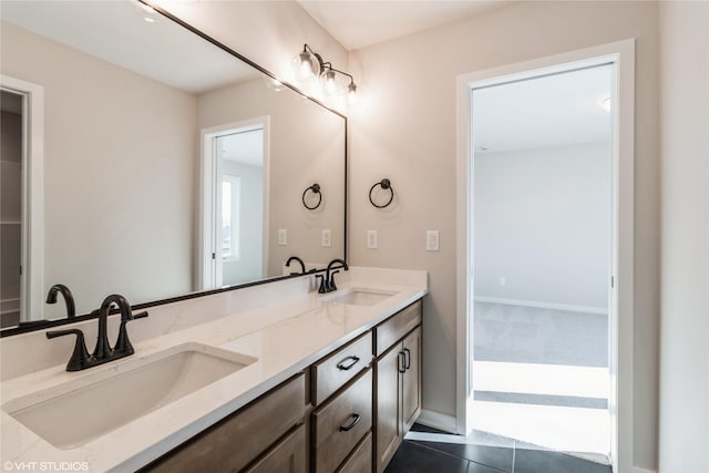 bathroom featuring tile patterned floors and vanity