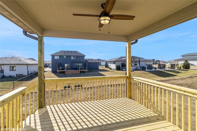 wooden deck with ceiling fan