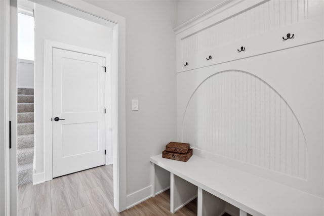 mudroom with light hardwood / wood-style flooring