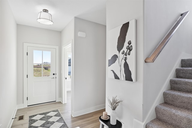 foyer featuring light wood-type flooring