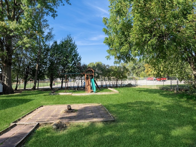 view of play area featuring a lawn