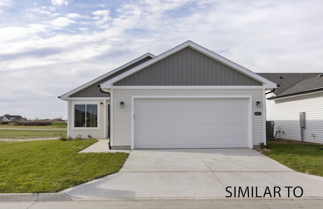 ranch-style home with a front lawn and a garage