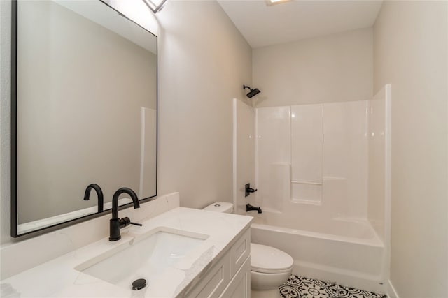 full bathroom with  shower combination, vanity, toilet, and tile patterned floors