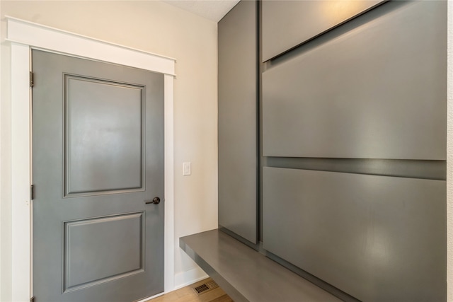 mudroom with light wood-type flooring