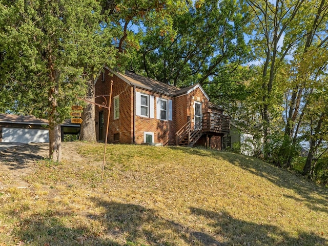 view of home's exterior with a yard