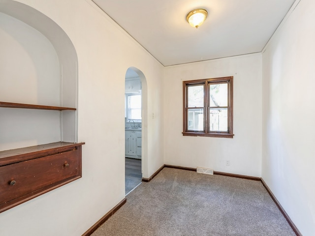 view of carpeted spare room