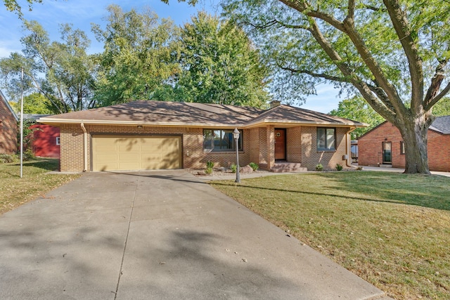 ranch-style home with a garage and a front lawn