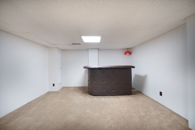 basement with carpet flooring