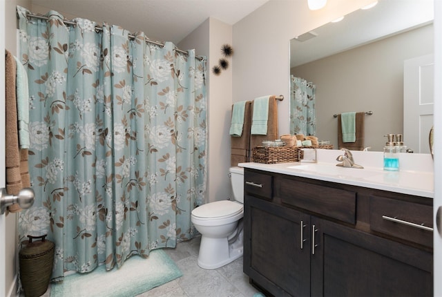 full bath with vanity, a shower with shower curtain, and toilet