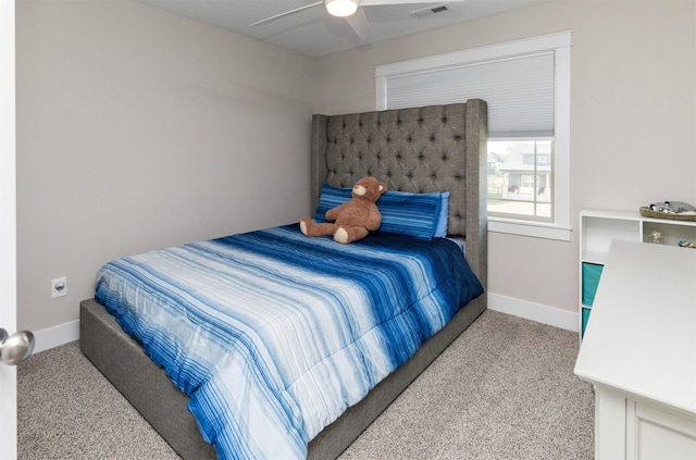 bedroom with visible vents, ceiling fan, baseboards, and carpet floors