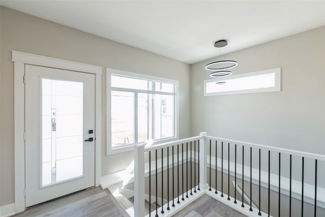 doorway to outside featuring hardwood / wood-style flooring