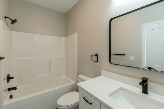 full bathroom with washtub / shower combination, vanity, and toilet