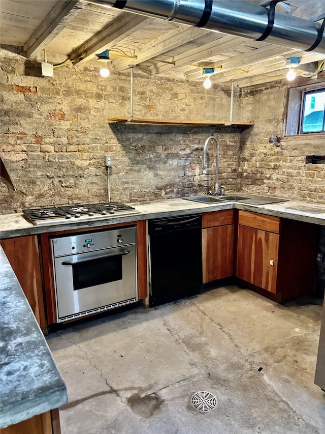 kitchen with beamed ceiling, sink, and stainless steel appliances