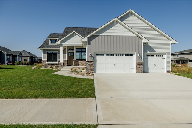 view of front facade featuring a garage and a front yard