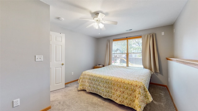 bedroom featuring ceiling fan and light colored carpet