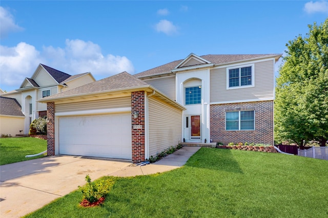 view of front of home featuring a garage and a front lawn