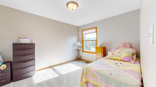 carpeted bedroom featuring lofted ceiling