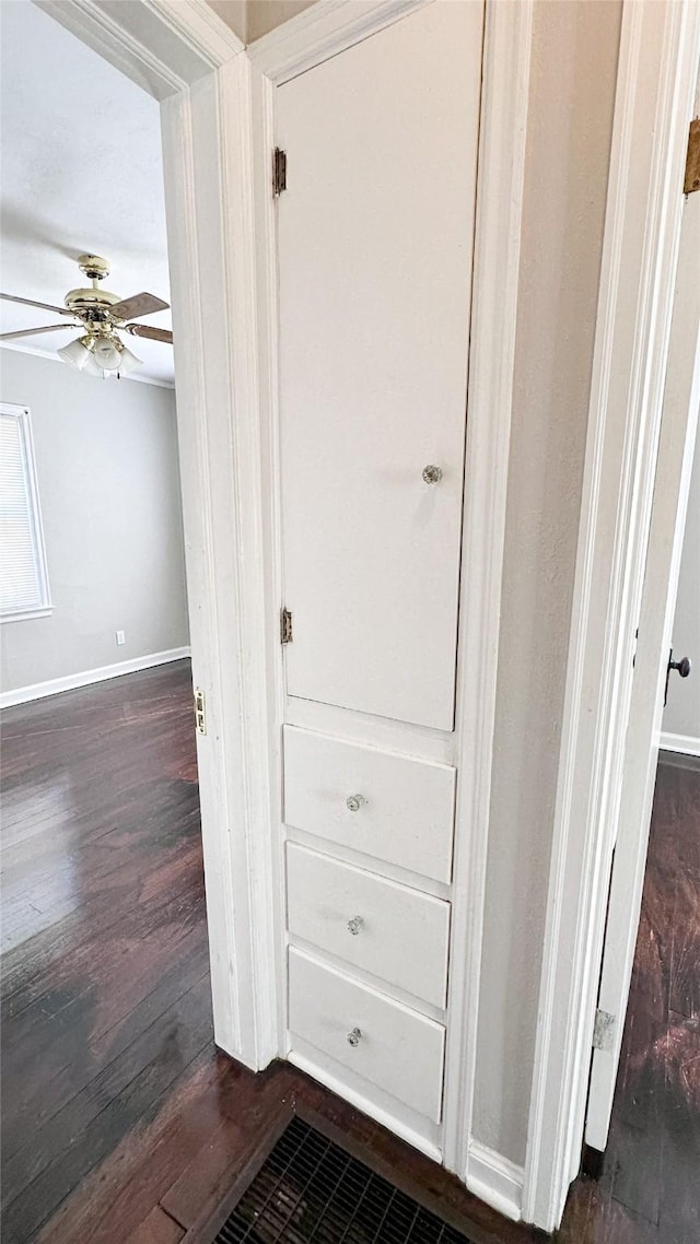 room details with ceiling fan and wood-type flooring