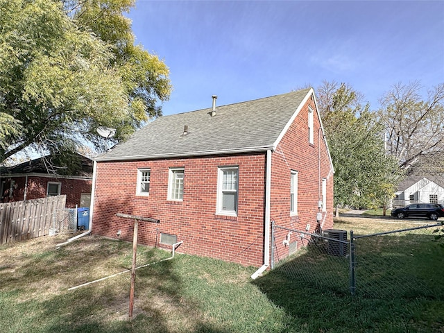 view of home's exterior featuring a yard