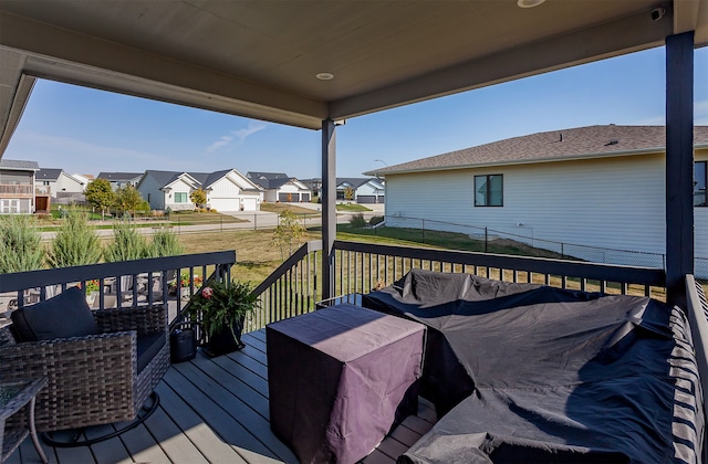 wooden deck with a yard