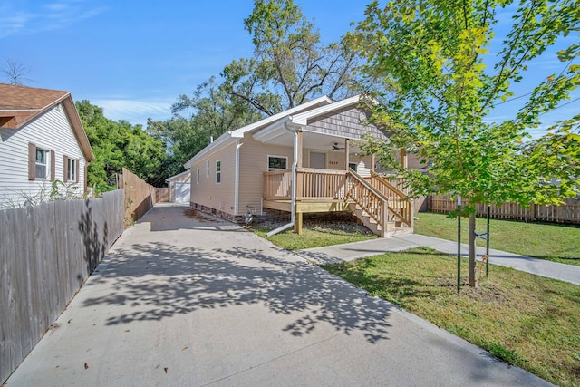 bungalow with a front yard