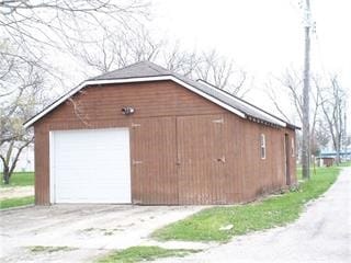 view of outbuilding featuring a garage