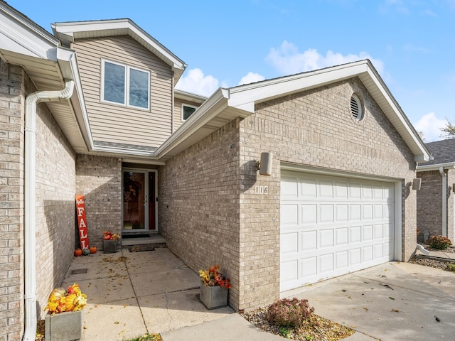 property entrance featuring a garage