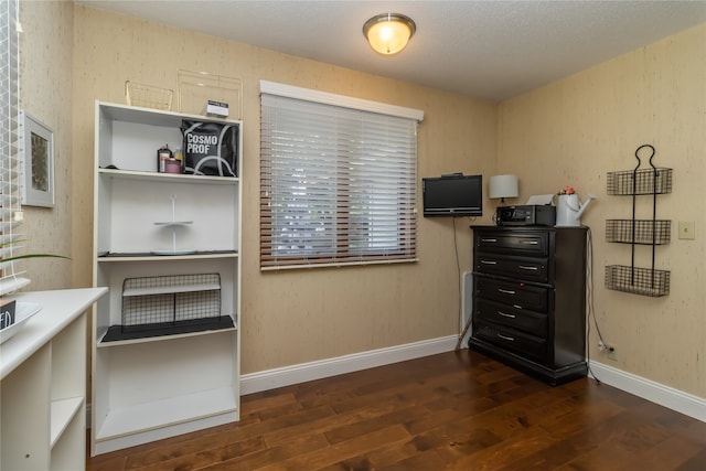 miscellaneous room with dark hardwood / wood-style flooring