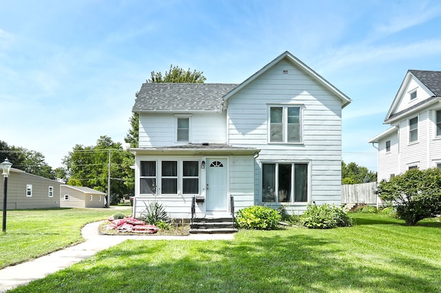 view of front of home with a front yard