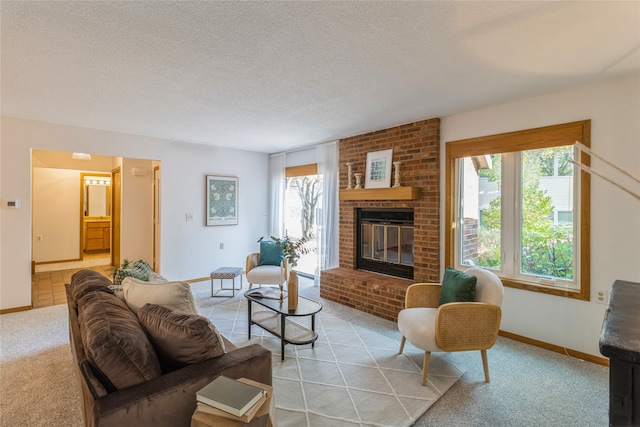 carpeted living room featuring a fireplace, a textured ceiling, and a wealth of natural light