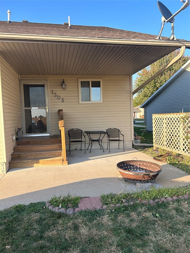 view of patio / terrace with a fire pit