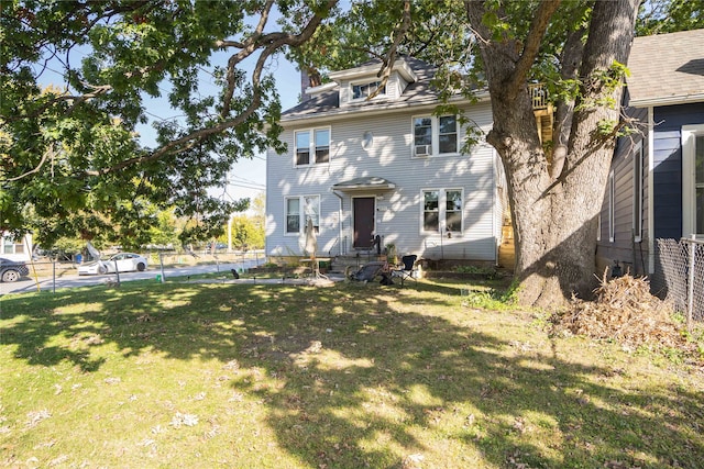 view of front of house with a front lawn