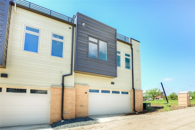 view of home's exterior with a garage