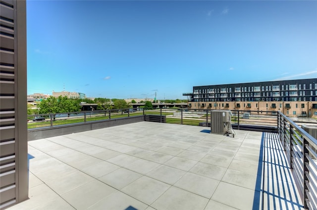 view of patio featuring a balcony