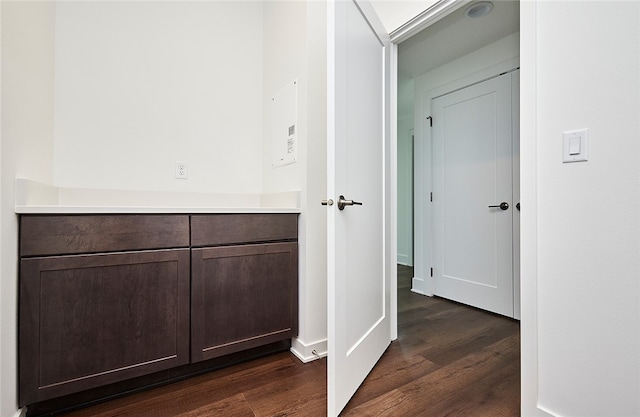 hallway featuring dark hardwood / wood-style floors