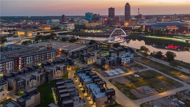 aerial view at dusk with a water view