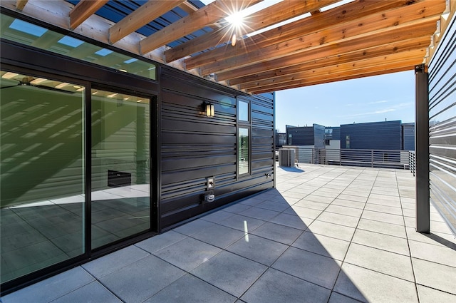 view of patio / terrace with a pergola and central AC unit