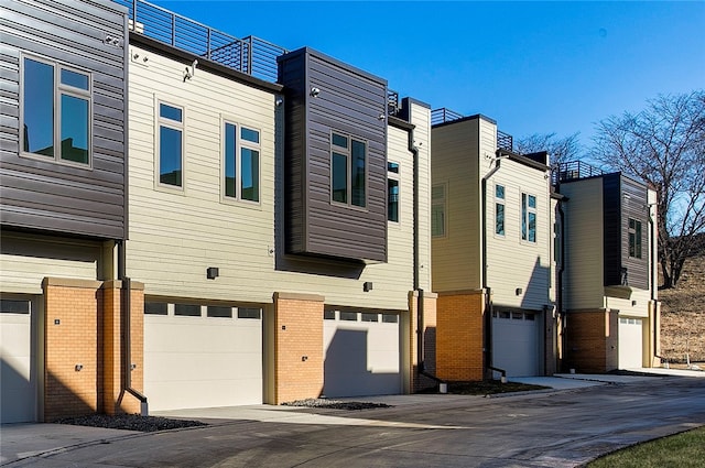 view of property exterior with a garage