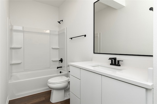 full bathroom with shower / bath combination, hardwood / wood-style flooring, vanity, and toilet