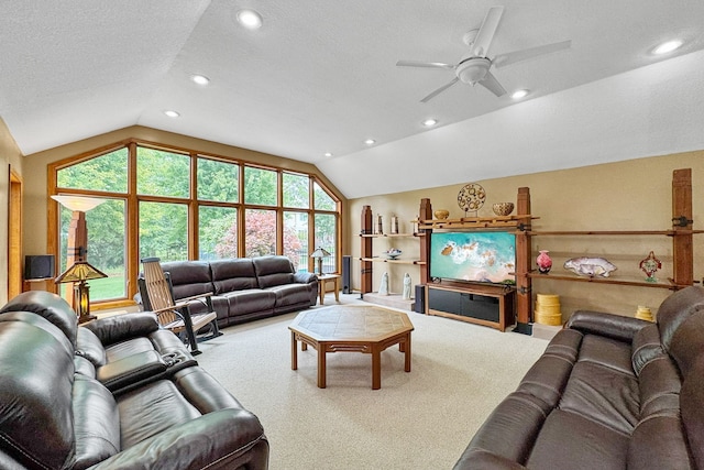 carpeted living room featuring ceiling fan, a textured ceiling, and vaulted ceiling