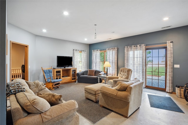 living room featuring a wealth of natural light