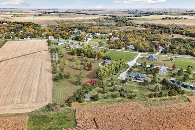 birds eye view of property featuring a rural view