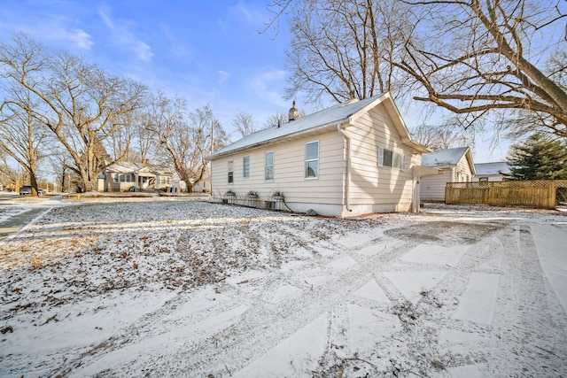 view of snow covered property