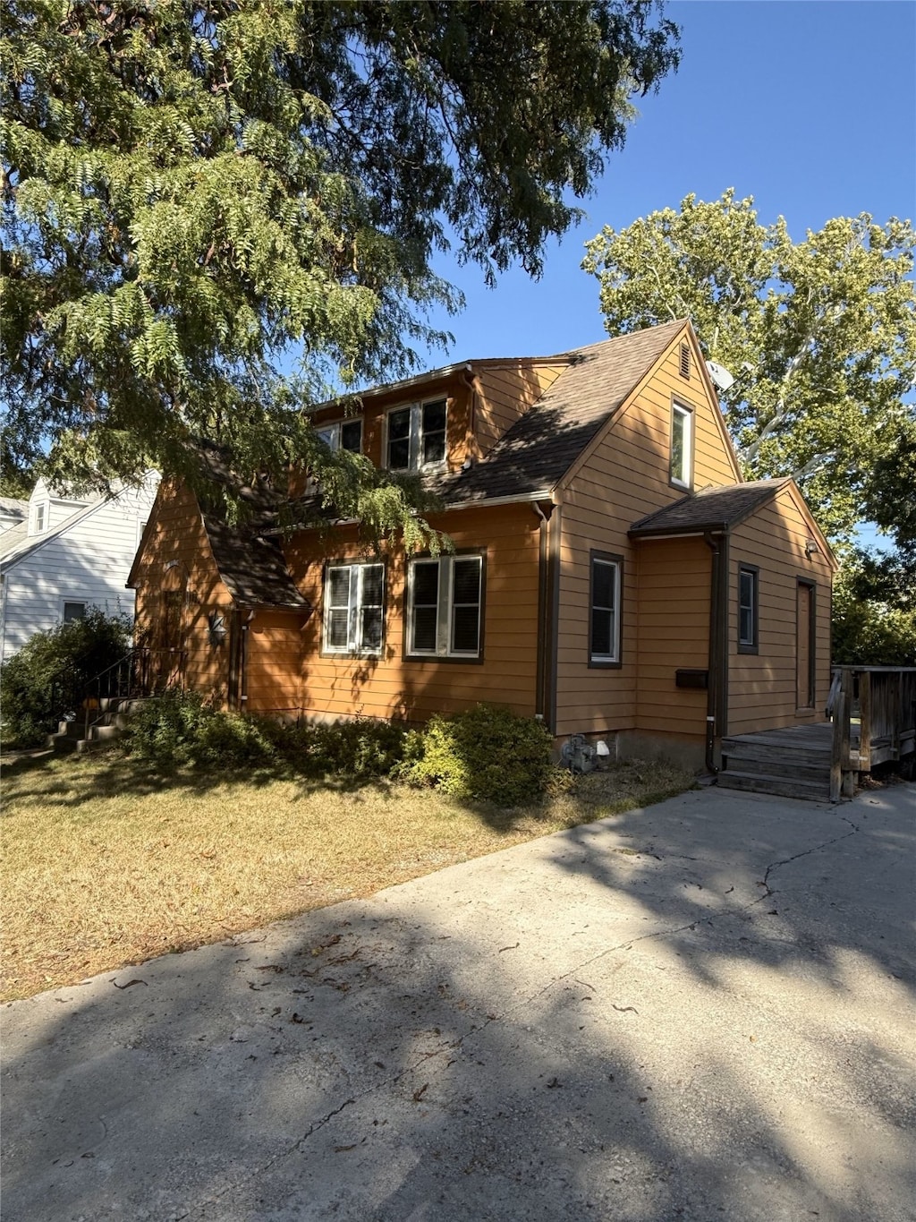 view of front of home with a wooden deck