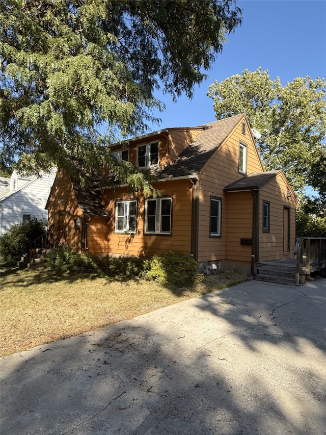 view of front of home with a wooden deck