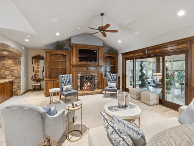 living room featuring a fireplace, light colored carpet, vaulted ceiling, and ceiling fan